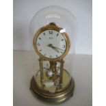 Kundol four hundred day suspension clock, under glass dome (complete with original purchase