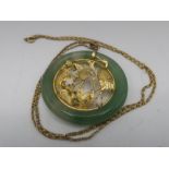 Chinese circular jade pendant with inset 18ct gold open work study of storks with two mounted