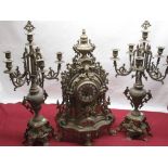 Contemporary cast brass clock garniture in the Rococo style comprising centrepiece clock with
