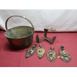 Three early 20th C paraffin lamps, brass jam pan with steel strap work handle, cobblers last and