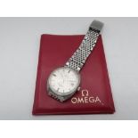 Omega Seamaster Cosmic automatic wristwatch with date. Stainless steel case on matching stainless