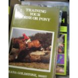 Selection of books on horses including "Training Your Horse", "Horse Health" and "Training the Sport