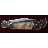 American pocket knife with clip blade and ornate handle, comprising of two piece bone grip and