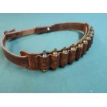 Leather gun strap by Harry Boden with intricate detail and 10 bullet holder for .22 bullets