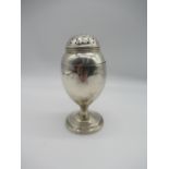 Early C19th provincial silver sugar caster, the egg shaped body engraved with a crest, unmarked