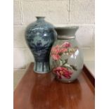 Large oriental patterned vase and another floral patterned vase