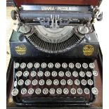 Urania-Piccola vintage typewriter with Querty keyboard in case