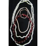 Natural pearl necklace with 14ct gold clasp stamped 14K L145cm, a necklace with faceted ruby
