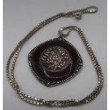 Silver and purple enamel circular pendant with floral central panel, marked 935.000, silver chain