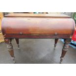 C19th campaign style writing desk, with hinged bow front revealing pull out writing slide and pigeon