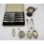Set of five cased hallmarked silver handled knives, a hallmarked Sterling silver cup awarded to E.