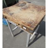 Metal bound wooden butchers block on modern metal square stand with stretchers H61 x L61 x D78