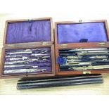 Mahogany cased drawing set stamped "Waddington", another similar cased drawing set with brass