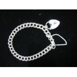 Hallmarked Sterling silver double chain charm bracelet with souvenir charms heart padlock and