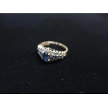 9ct gold Diamond and blue sapphire ring stamped 375 Size M, 2.6g