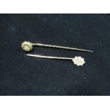 Victorian 9ct gold pin and another similar with diamond to center a silver repoussé trinket dish and