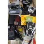 Polaroid button camera, Kodak VR35 camera, Beirette 35mm camera, Bolex cine camera and various