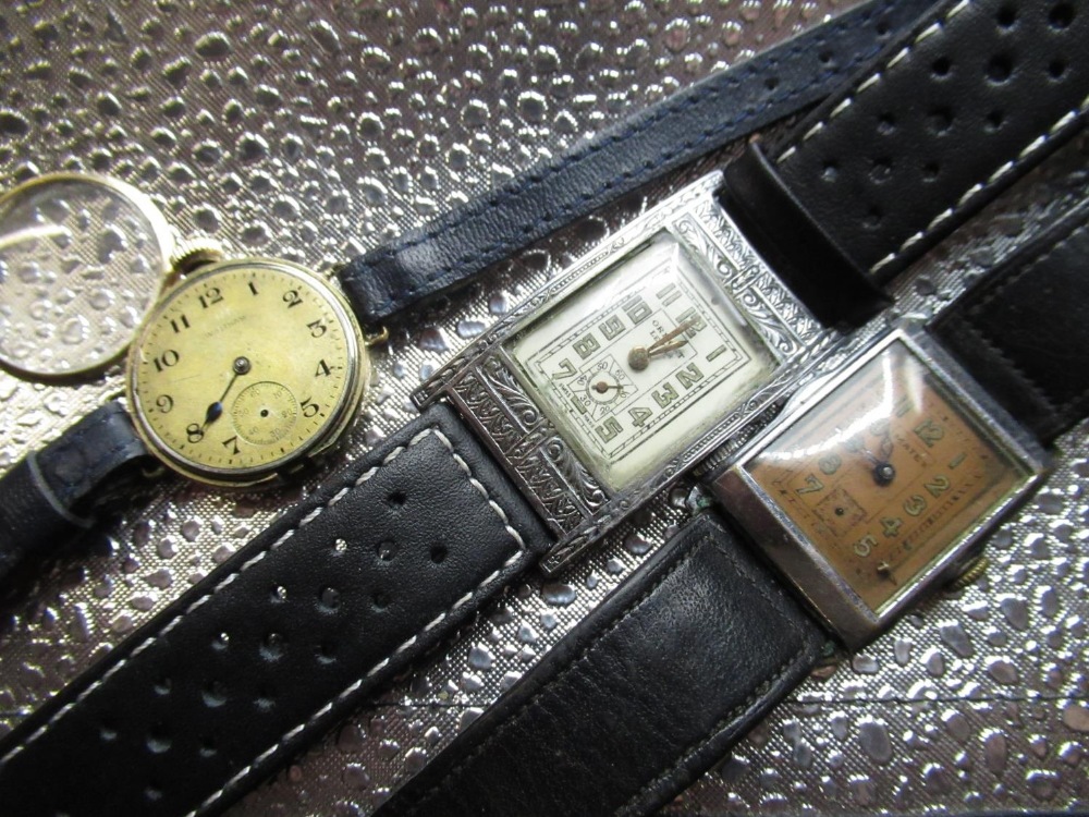 Early C20th Waltham trench watch, rolled gold case on leather strap, movement signed and numbered