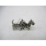 Silver brooch in the firm of two dogs stamped Sterling