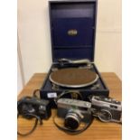 Triumph portable gramophone, 7.5 Petri camera, Ricoh 35FM camera and a Yashica Zoomtec 90 Super