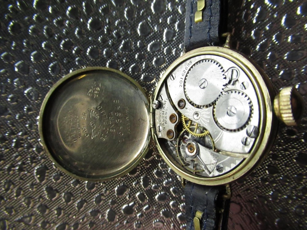 Early C20th Waltham trench watch, rolled gold case on leather strap, movement signed and numbered - Image 2 of 3