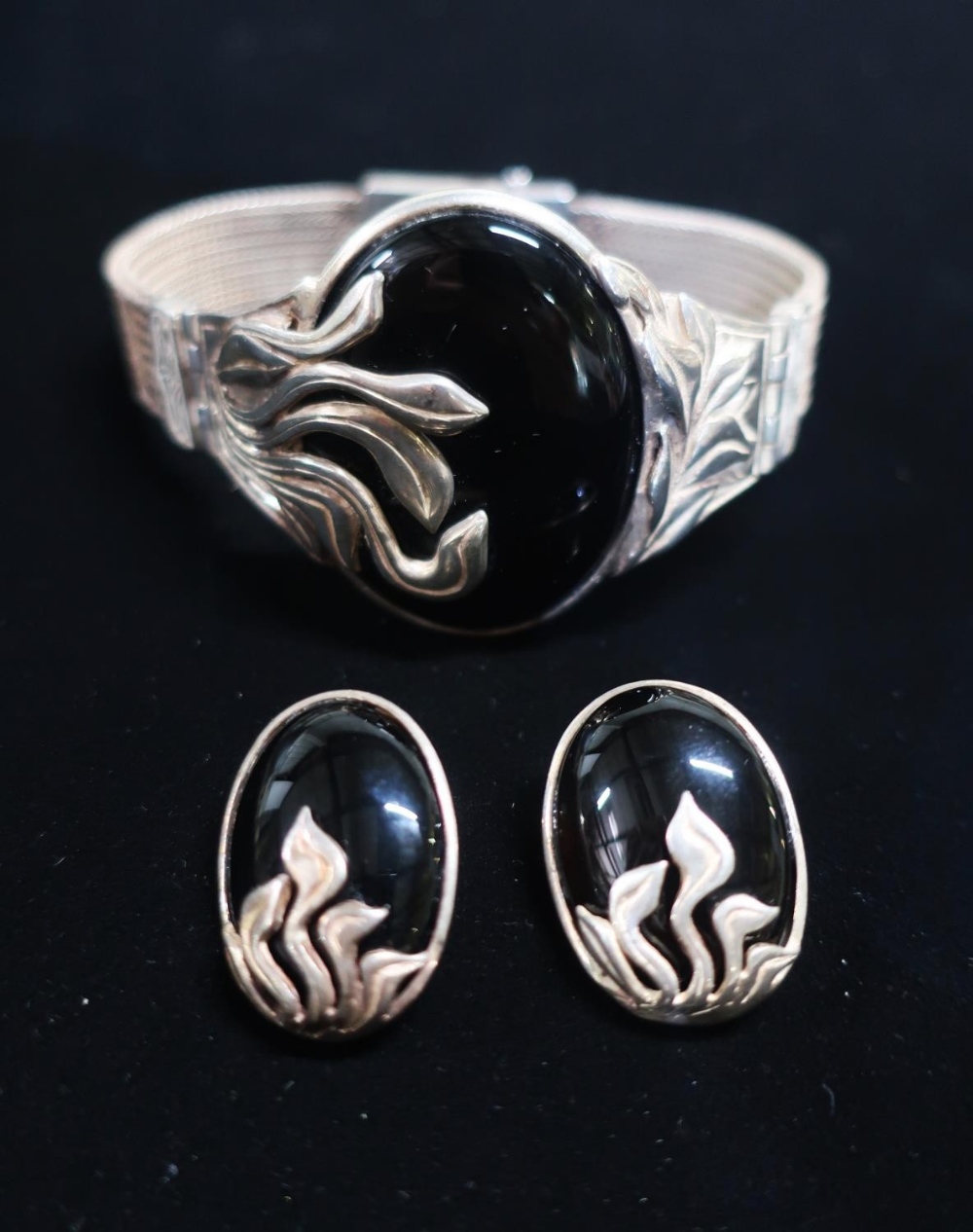 Art Nouveau style Sterling silver bracelet and earring set with onyx and silver foliage centre and