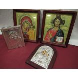 Two silvered icons depicting Mary and infant Jesus and a pair of C19th style Russian icons (4)