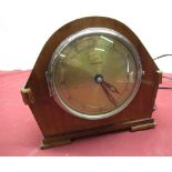 Mid-century Genalex electric mantle clock with circular Roman dial in arched top case, Serial no.