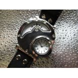 DNKY style twin display quartz wristwatch, chrome plated case on leather strap, twin movement