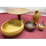 Selection of various turned wood bowls, stands and a wooden penguin