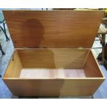 Mid century teak blanket box with hinged lid, on castors W100cm D46cm H48cm