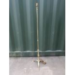 Hollywood regency style brass standard lamp on three splayed legs H129cm