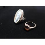 Aberlone Mother of Pearl ring with silver mount stamped 925 Size M and another ring with amethyst