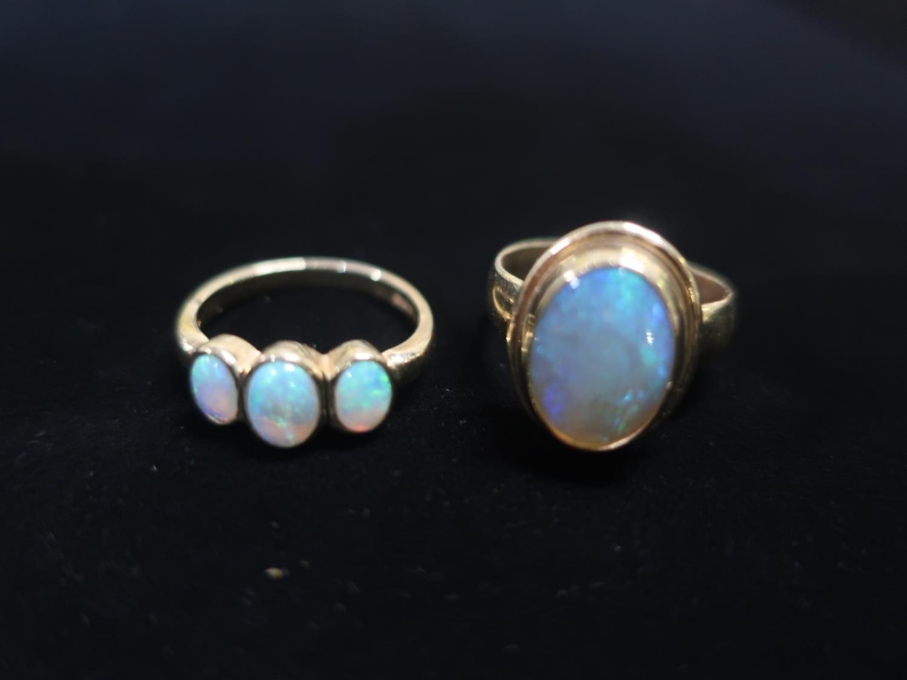 Hallmarked 9ct gold three stone moonstone ring Size P and a another hallmarked 9ct gold moonstone