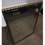 Rectangular bevel-edged mirror in rope twist gilt frame W.66 cm H.95 cm