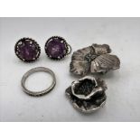 Pair of Sterling Silver clip on earrings with central lilac stone, stamped 925 diameter 2cm, a