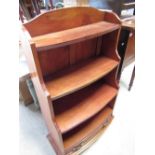 Regency style mahogany book case, three shelves above a single drawer on bracket feet H103cm W59cm
