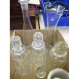 Pair of glass decanters, another square cut decanter, and two wine carafes