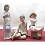 Nao figure of a young girl in mop cap holding a puppy H17cm, Nao figure of a seated female ballerina