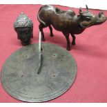 Early C20th bronze figure of a water buffalo with traces of gilt detail H14cm, C20th cast bronze