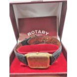 Rotary quartz wristwatch, rectangular gold plated case on brown leather strap, snap on stainless