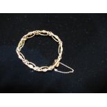 Early 20th century 9ct gold fancy link bracelet, stamped 9C 15.5g