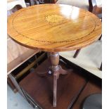 Edwardian satinwood circular table top, the centre with fan paterae and checkered border, on later