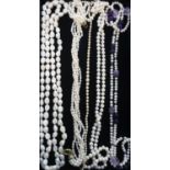 Collection of pearl necklaces including different styles and a simulated pearl necklace with