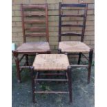 Rush seated ladder back oak dining chair, another similar chair and a four legged stool (3)