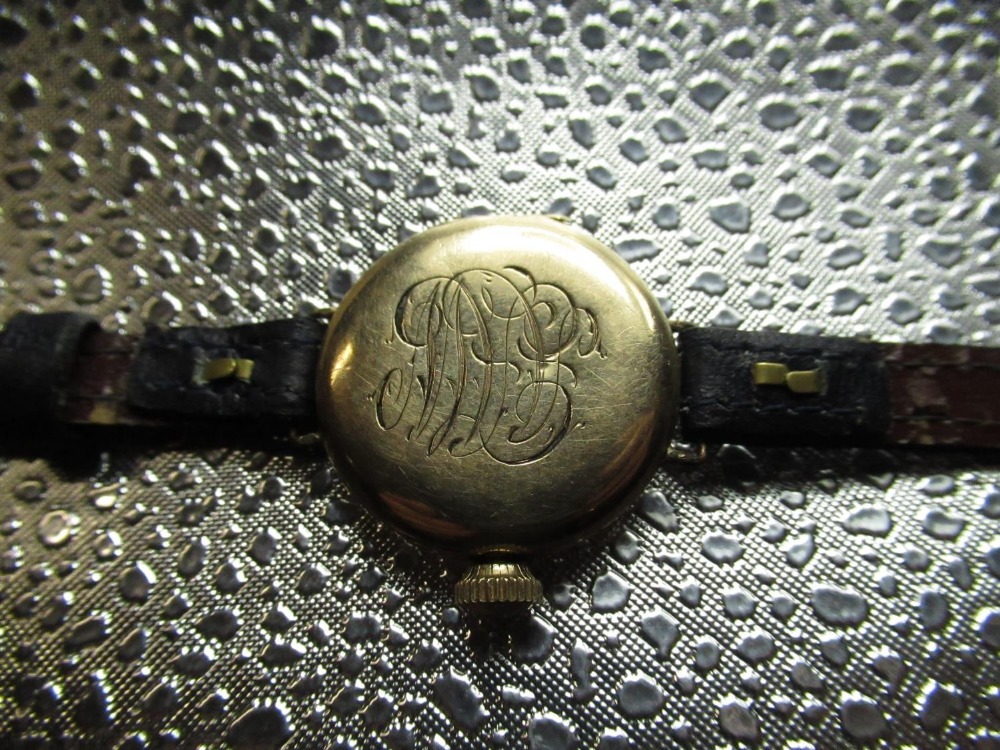 Early C20th Waltham trench watch, rolled gold case on leather strap, movement signed and numbered - Image 3 of 3