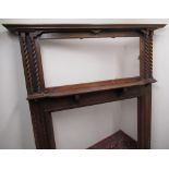 1930's oak fire surround with moulded cornice, octagonal mirror with twin barley twist supports, and