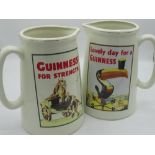 Pair of Guinness jugs, one featuring the Guinness Toucan with official merchandise mark to bottom (