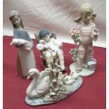 Lladro figure of a sleeping girl in a rocking chair holding a doll H11cm, Lladro figure of a young