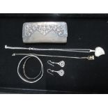 Hallmarked Sterling silver clasped purse, hallmarked Sterling silver bangle, Sheffield 2000, a